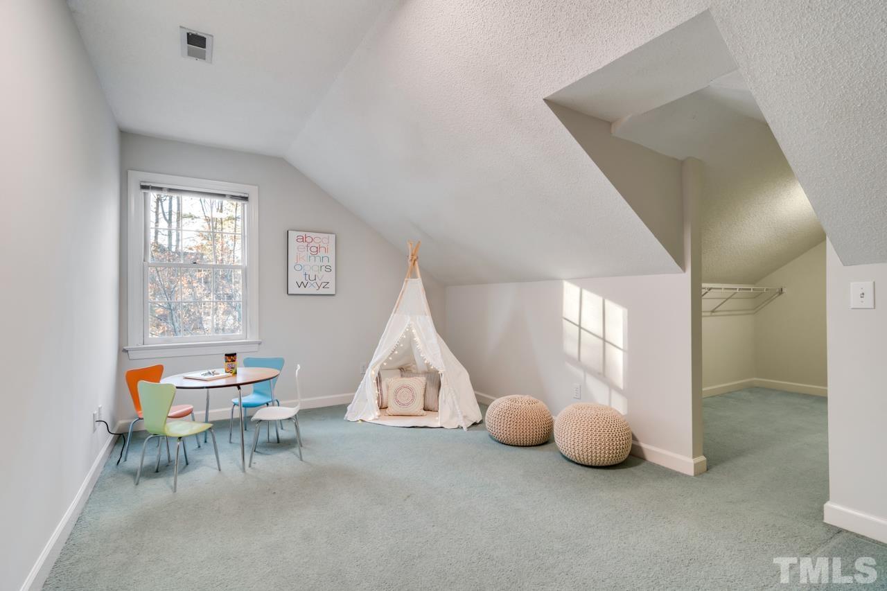 2116 Fountain Ridge Road Chapel Hill, NC 27517 - Photo 20 of 27 a living room with furniture and a window