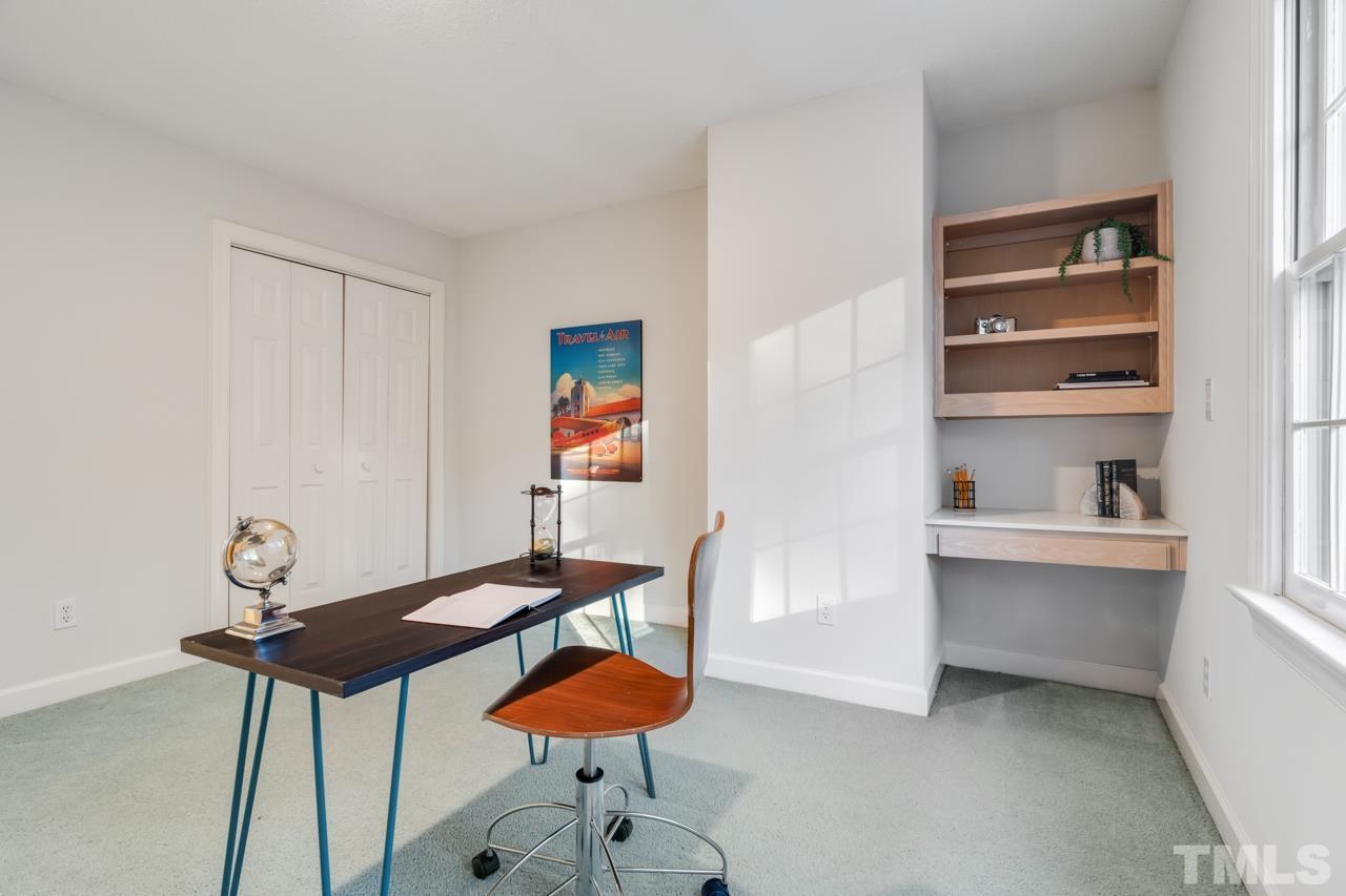 2116 Fountain Ridge Road Chapel Hill, NC 27517 - Photo 22 of 27 a view of a room with a table and chairs
