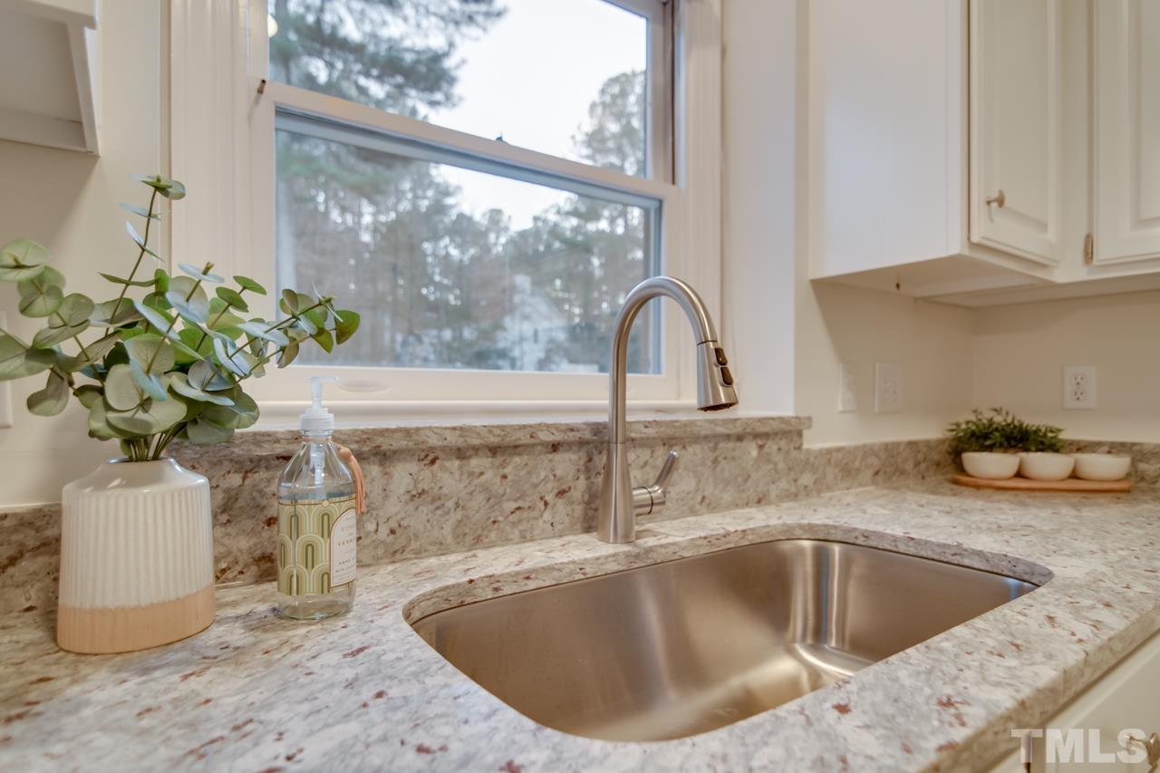 2116 Fountain Ridge Road Chapel Hill, NC 27517 - Photo 10 of 27 a close view of sink and tap