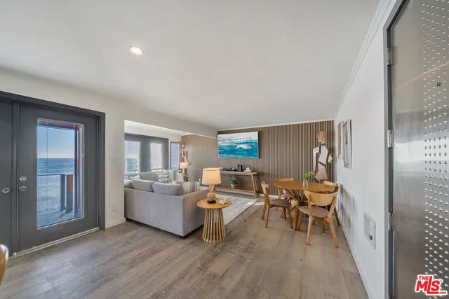 a large kitchen with stainless steel appliances granite countertop a stove and a sink