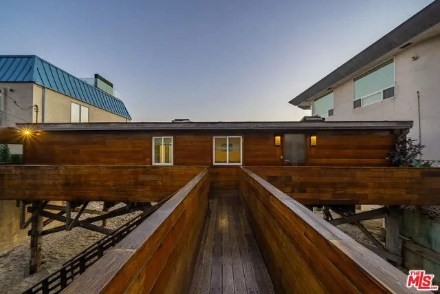 a view of swimming pool with outdoor seating