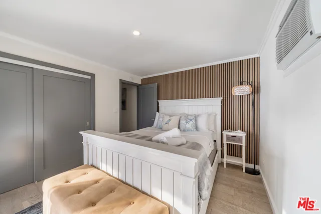 a bathroom with a sink mirror and toilet