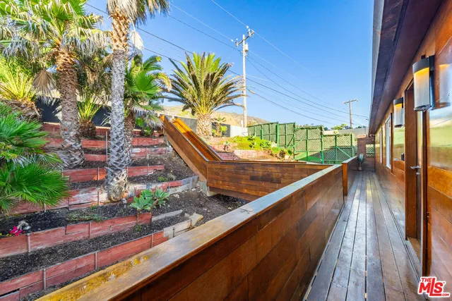 a view of swimming pool from a balcony