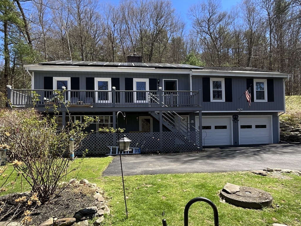 47 South Cross Road Gill, MA 01354 - Photo 4 of 42 a front view of a house with garden