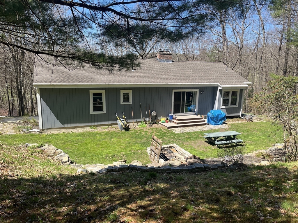 47 South Cross Road Gill, MA 01354 - Photo 6 of 42 a view of a house with backyard and sitting area