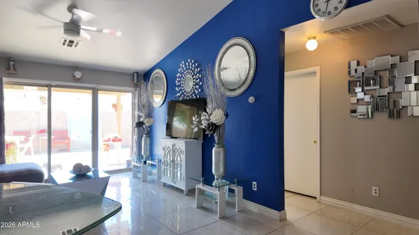 a view of living room with wooden floor