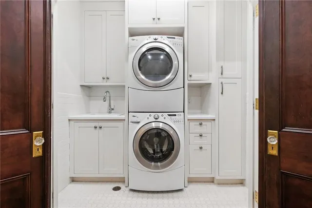 a utility room with dryer and washer