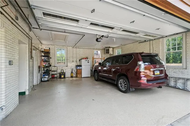 a view of a garage with rack and bicycle