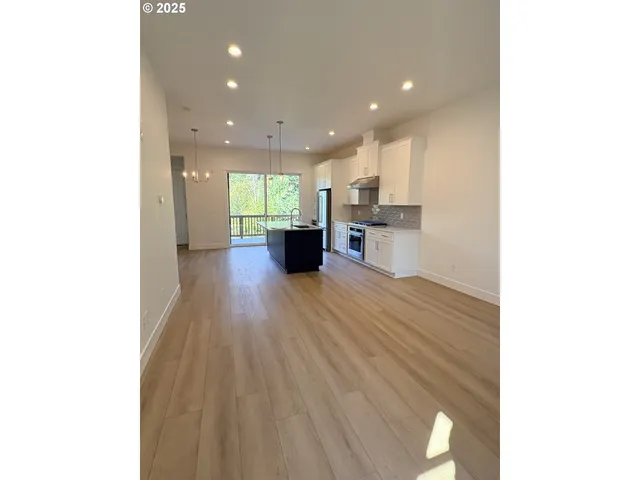 a view of kitchen and windows