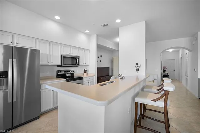 a view of a park with palm trees