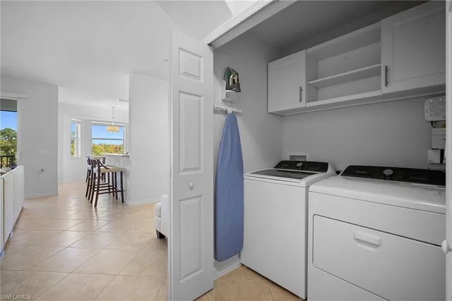 a view of a dining hall with lots of furniture and wooden floor