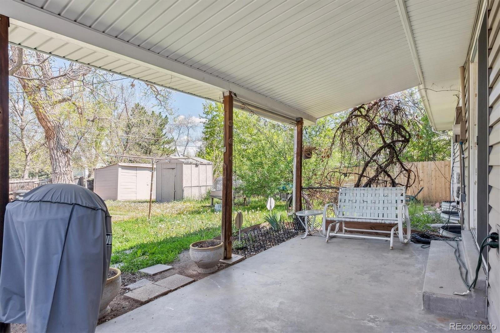 200 Perry Street Denver, CO 80219 - Photo 11 of 24 a house view with a garden space