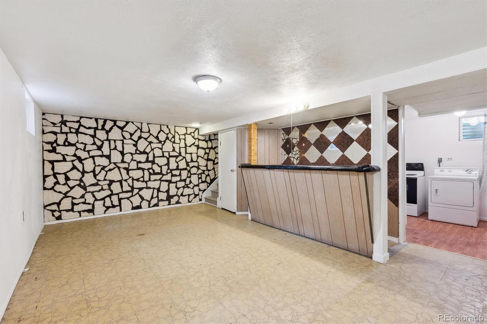 200 Perry Street Denver, CO 80219 - Photo 21 of 24 a view of a black and white wall