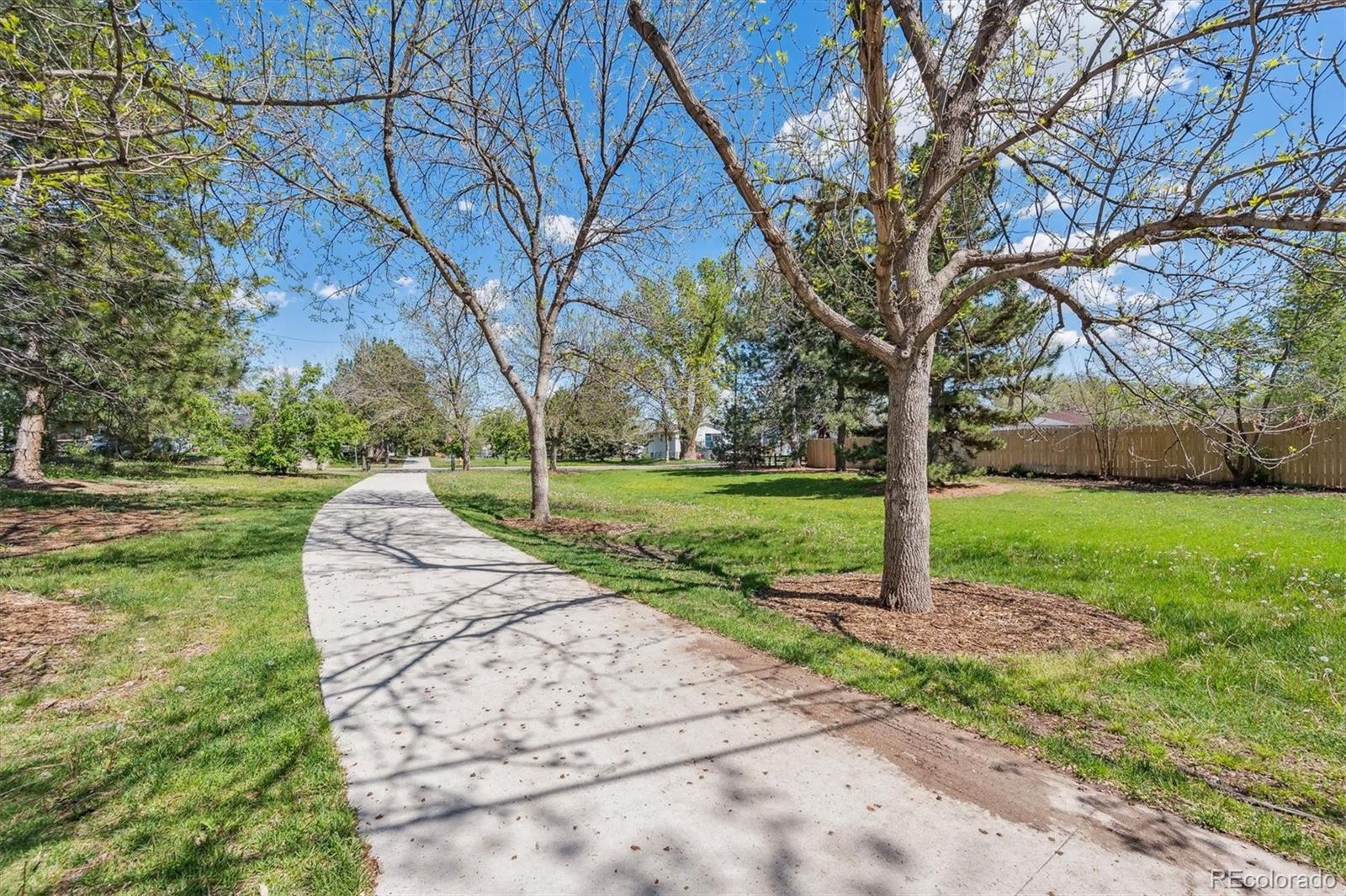 200 Perry Street Denver, CO 80219 - Photo 3 of 24 a view of a park with tree s