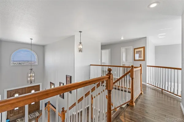 a view of entryway with wooden floor