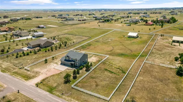 a view of a balcony with an ocean view