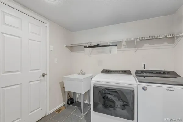 a utility room with dryer and washer