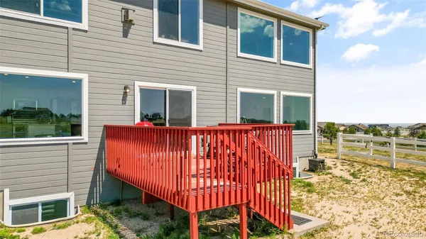 a view of swimming pool with outdoor seating