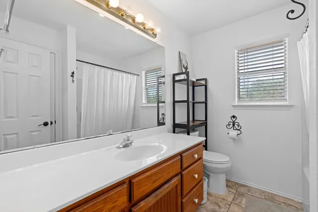 a house view with a garden space