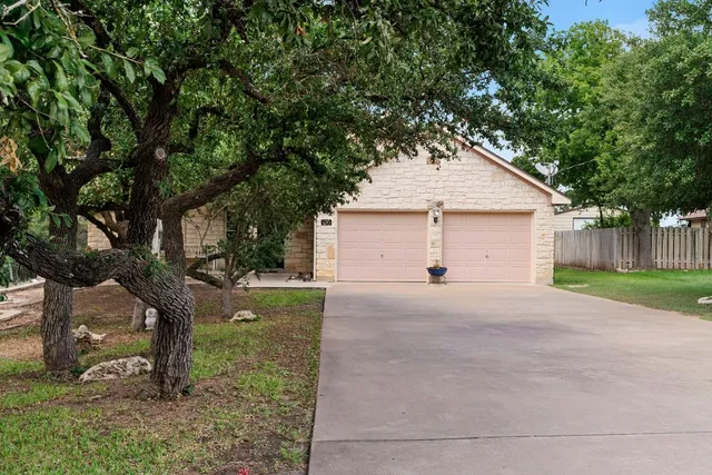 a house with trees in the background