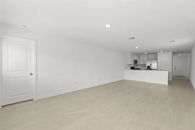 a view of kitchen and kitchen with sink