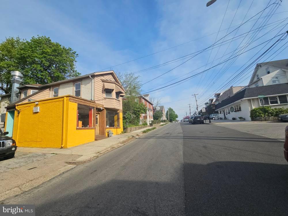 107 East County Line Road, Unit 2 Ardmore, PA 19003 - Photo 15 of 17 a view of a building with a road