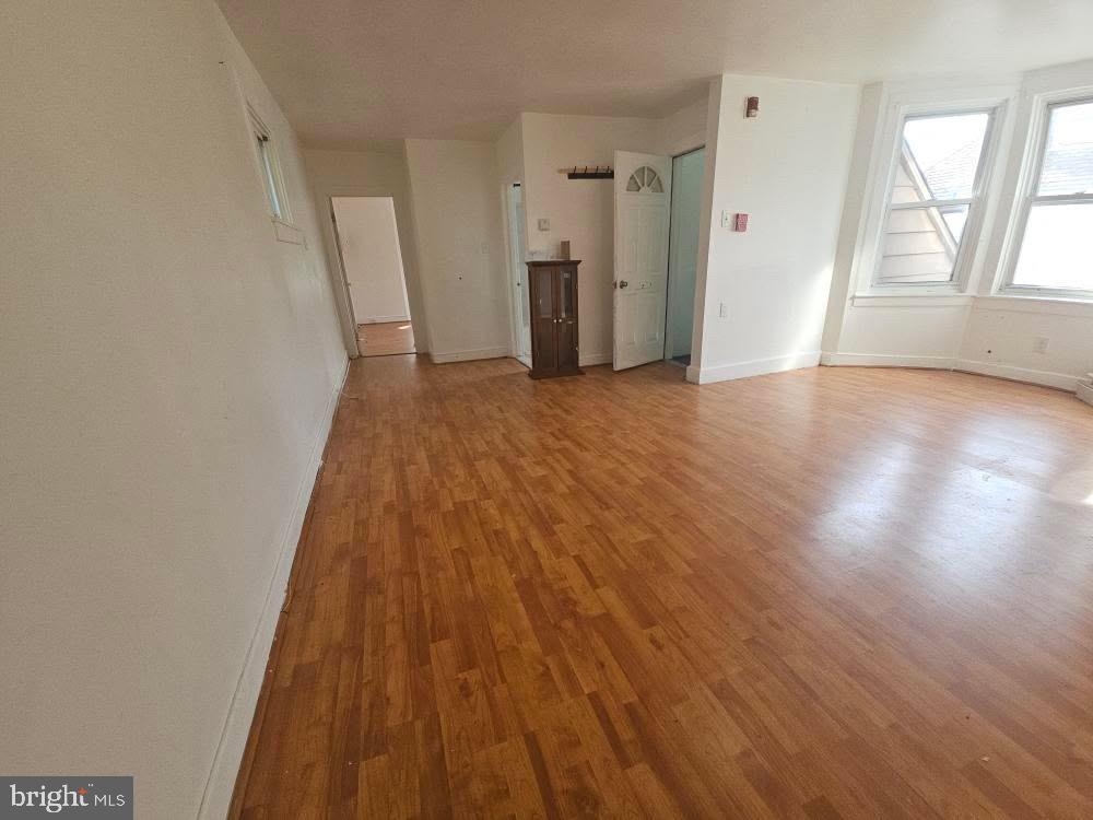 107 East County Line Road, Unit 2 Ardmore, PA 19003 - Photo 3 of 17 wooden floor in an empty room