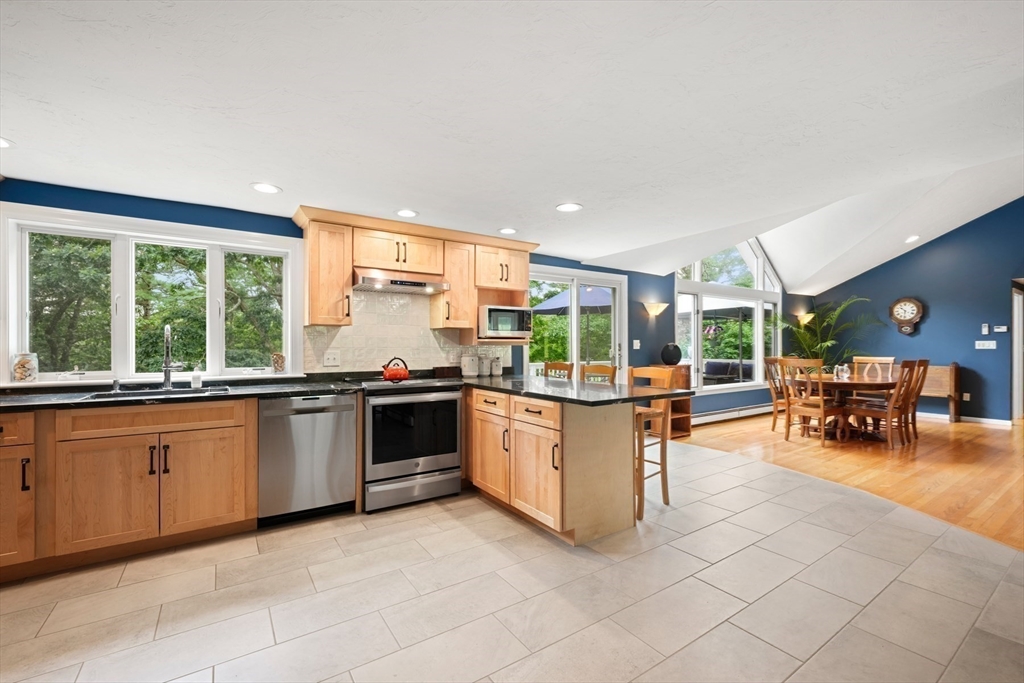 91 Canoe Tree Way Marshfield, MA 02050 - Photo 12 of 35 a kitchen with sink and view of living room