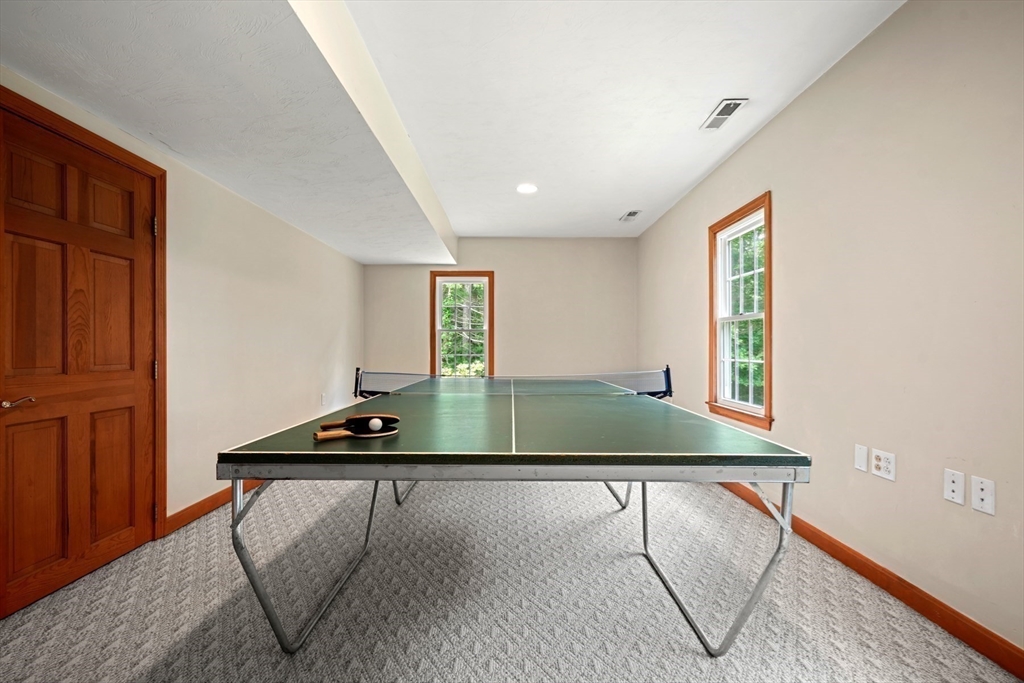 91 Canoe Tree Way Marshfield, MA 02050 - Photo 19 of 35 a room with furniture and window