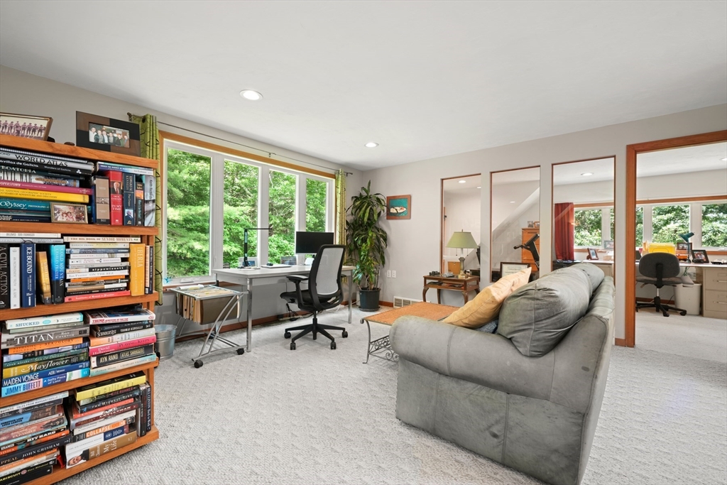 91 Canoe Tree Way Marshfield, MA 02050 - Photo 22 of 35 a living room with furniture and a large window