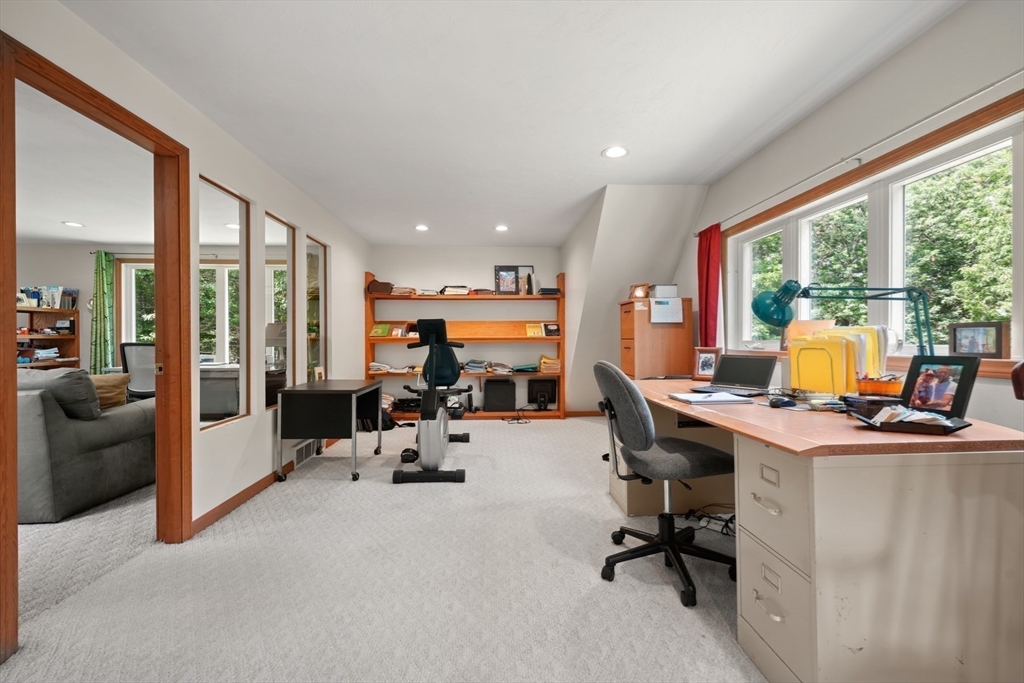 91 Canoe Tree Way Marshfield, MA 02050 - Photo 23 of 35 a view of a workspace with furniture and a window