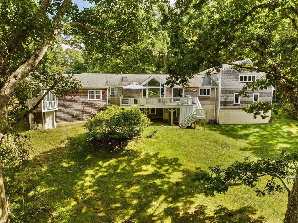 91 Canoe Tree Way Marshfield, MA 02050 - Photo 27 of 35 a front view of a house with a yard