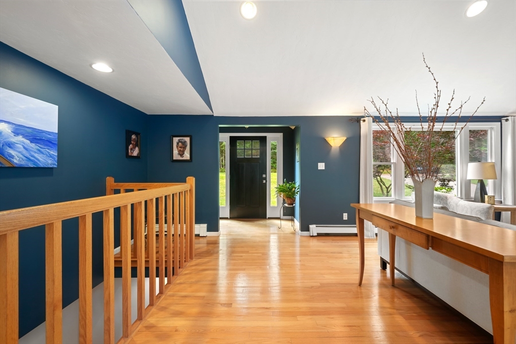 91 Canoe Tree Way Marshfield, MA 02050 - Photo 3 of 35 a view of a lobby with black carpet