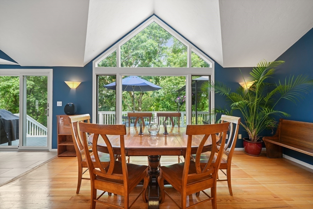 91 Canoe Tree Way Marshfield, MA 02050 - Photo 8 of 35 a view of a dining room with furniture window and wooden floor