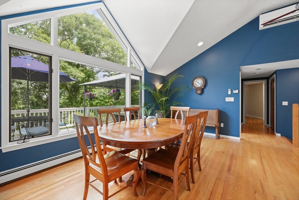 91 Canoe Tree Way Marshfield, MA 02050 - Photo 9 of 35 a view of a dining room with furniture window and wooden floor