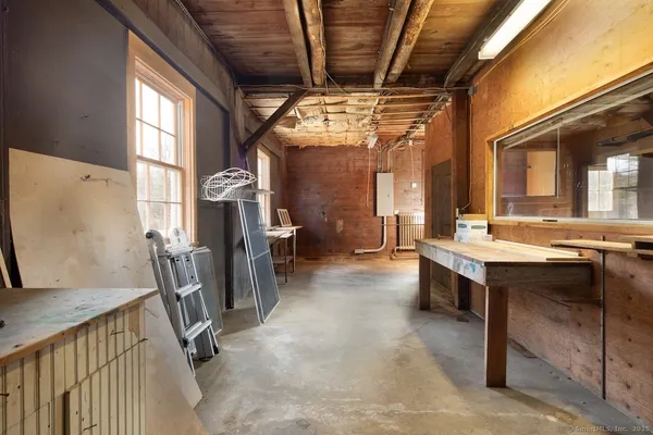 a view of a hallway with workspace