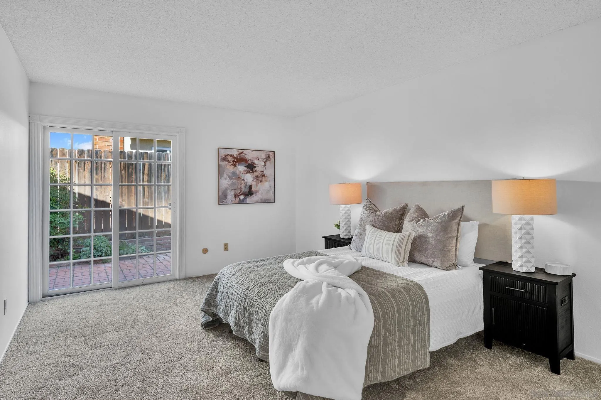 10834 Buggywhip Drive Spring Valley, CA 91978 - Photo 13 of 36 a bedroom with a bed and wooden floor