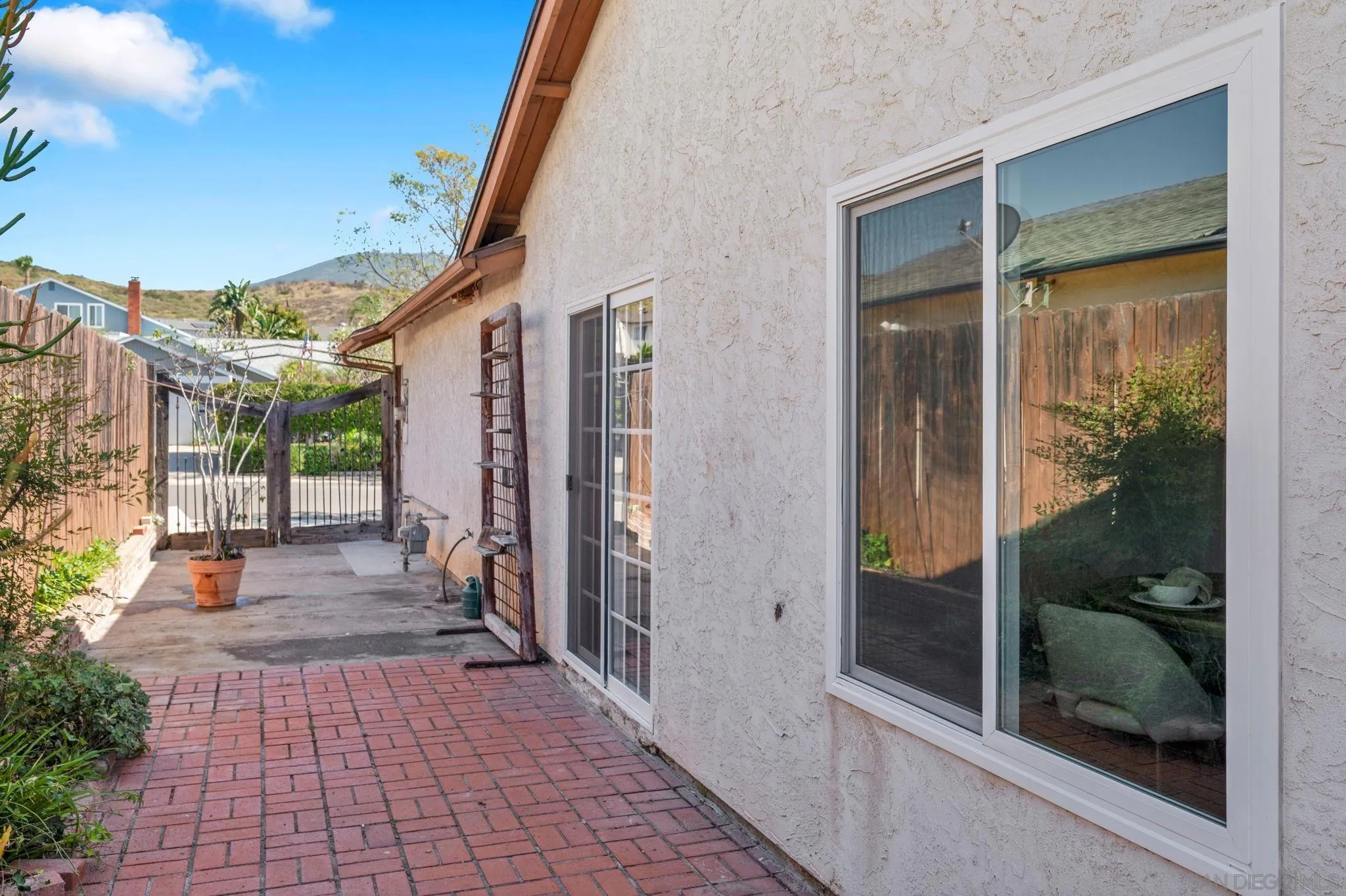10834 Buggywhip Drive Spring Valley, CA 91978 - Photo 28 of 36 a view of a house with a porch