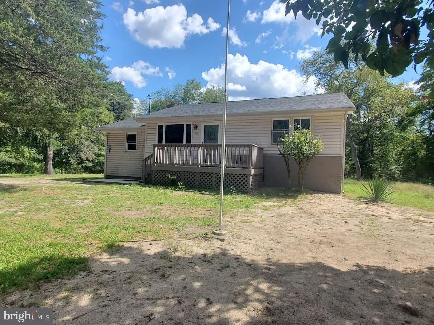 300 Ridge Road Browns Mills, NJ 08015 - Photo 1 of 28 a house with trees in the background