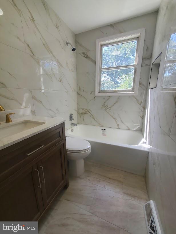 300 Ridge Road Browns Mills, NJ 08015 - Photo 17 of 28 a bathroom with a sink a toilet and bathtub