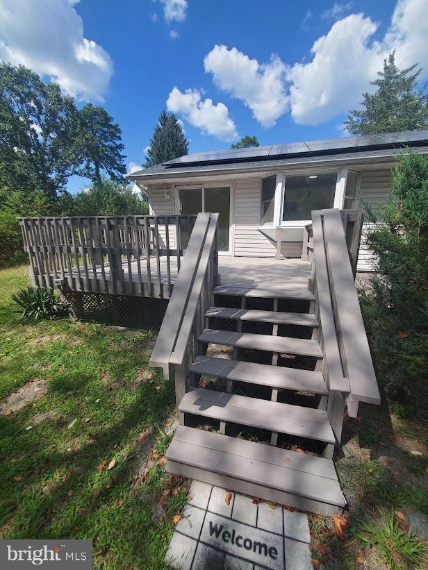 300 Ridge Road Browns Mills, NJ 08015 - Photo 26 of 28 a view of a patio with a table and chairs