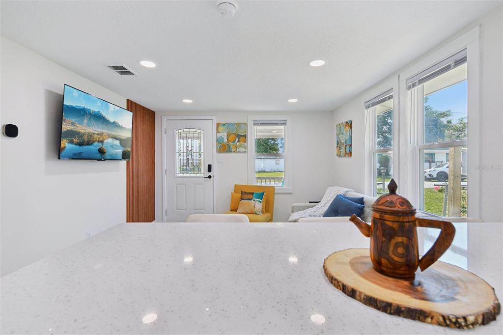 1626 Gar Street St. Cloud, FL 34771 - Photo 11 of 45 a view of a living room and workspace
