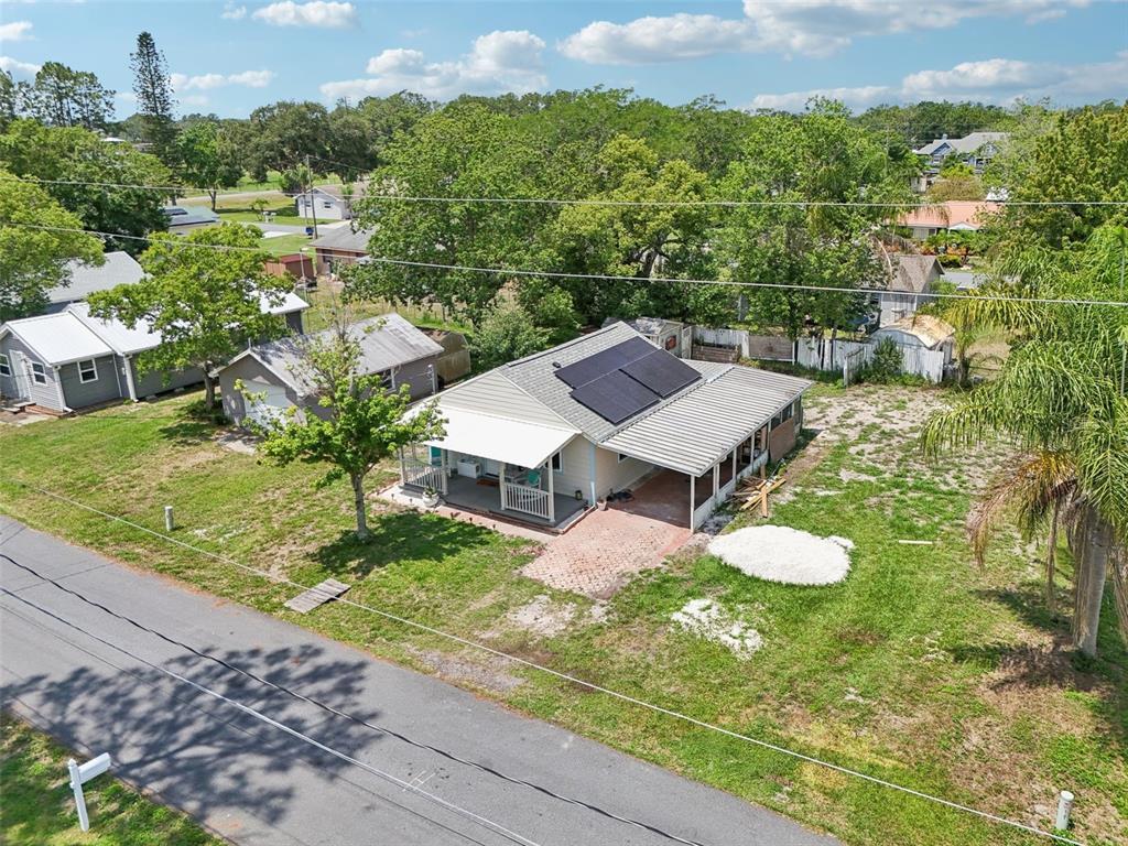 1626 Gar Street St. Cloud, FL 34771 - Photo 31 of 45 an aerial view of a residential houses with city view