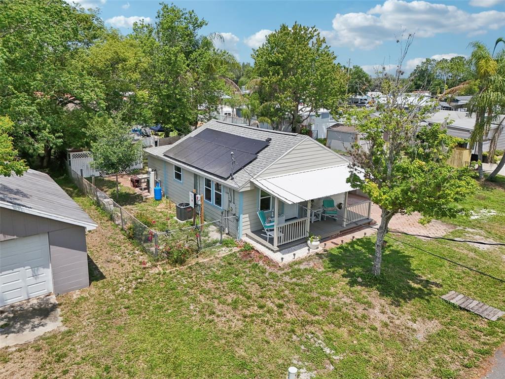 1626 Gar Street St. Cloud, FL 34771 - Photo 32 of 45 aerial view of a house with a yard table and chairs