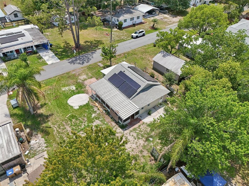 1626 Gar Street St. Cloud, FL 34771 - Photo 34 of 45 an aerial view of a house with garden space and street view