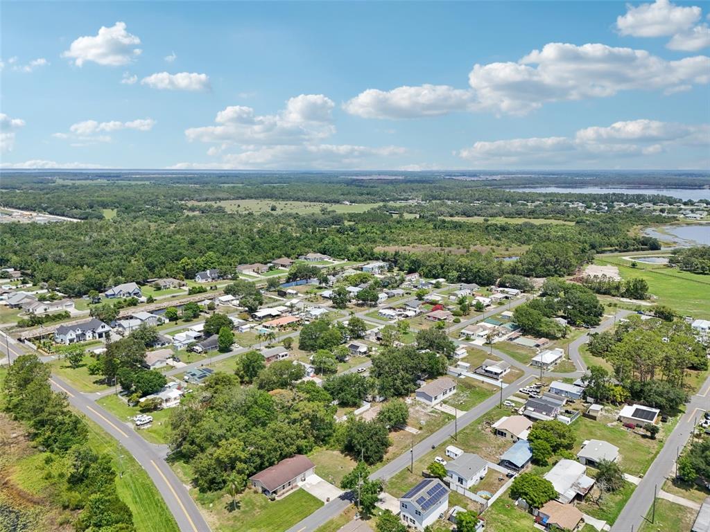 1626 Gar Street St. Cloud, FL 34771 - Photo 36 of 45 an aerial view of residential houses with outdoor space