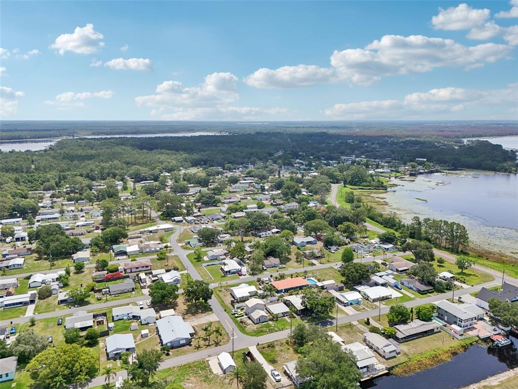 1626 Gar Street St. Cloud, FL 34771 - Photo 42 of 45 an aerial view of residential houses with outdoor space