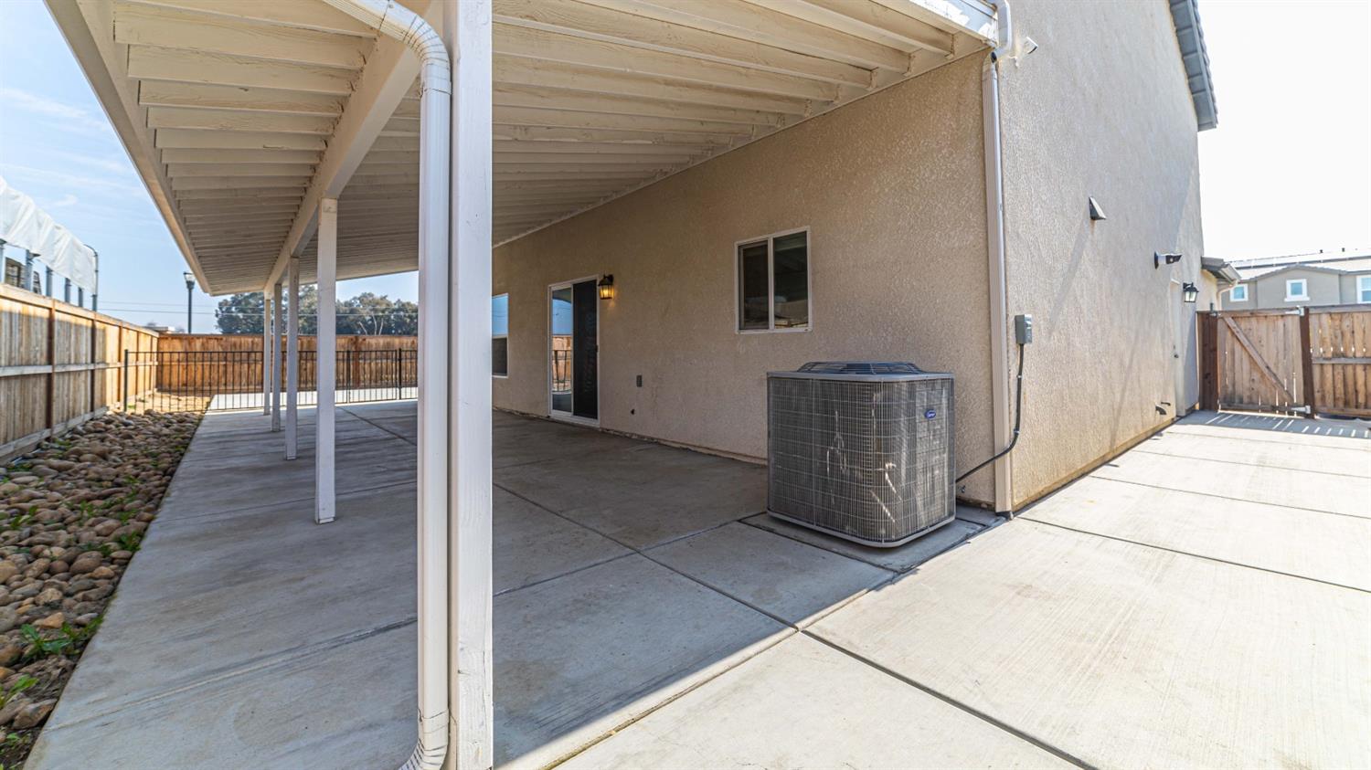 512 Barbara Avenue Sanger, CA 93657 - Photo 12 of 40 a view of a porch with wooden floor