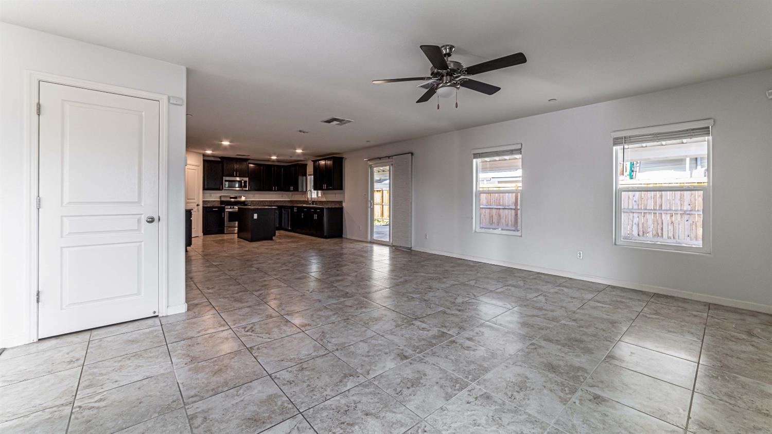 512 Barbara Avenue Sanger, CA 93657 - Photo 18 of 40 a view of empty room with a kitchen