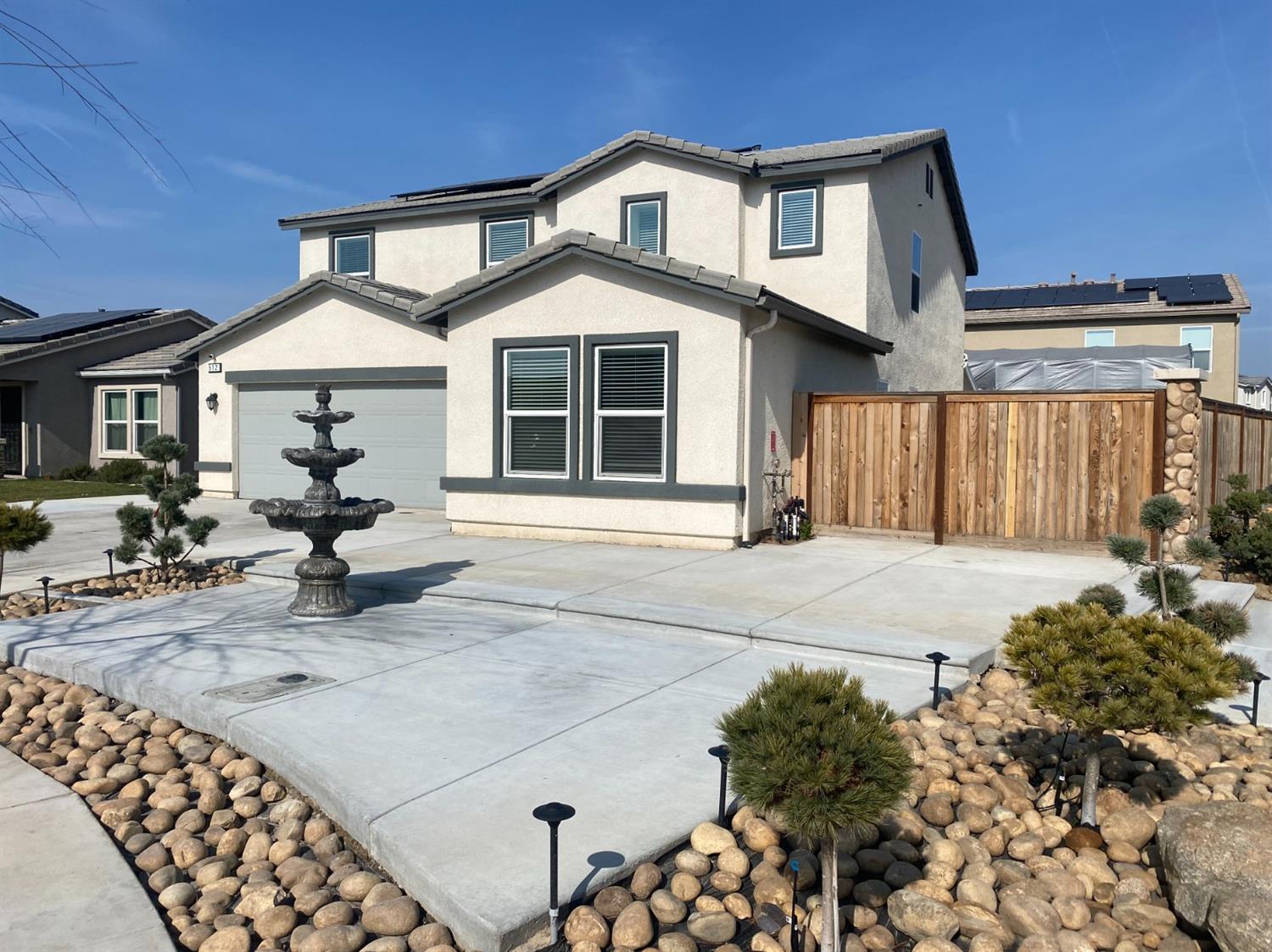 512 Barbara Avenue Sanger, CA 93657 - Photo 2 of 40 a front view of a house with a yard